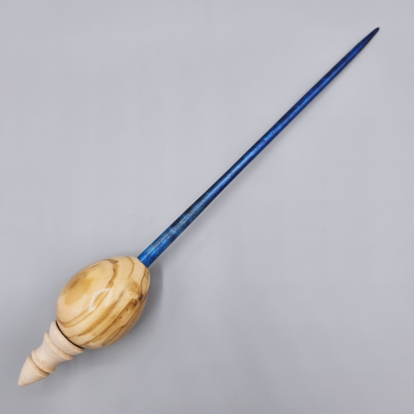 Olive wood egg spindle with curly maple dyed shaft